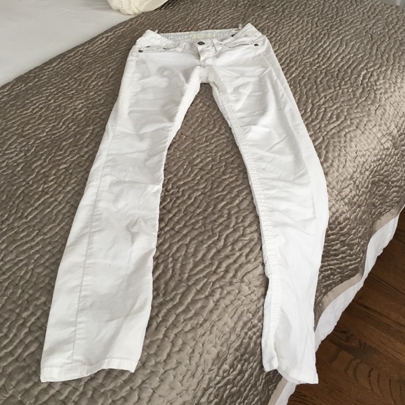 Stitches off white straight leg cords. Size 27.
