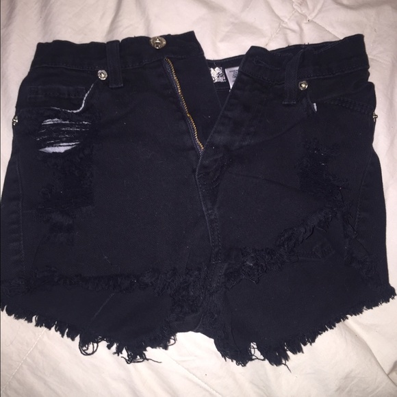 Tiny black shorts