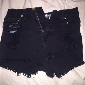 Tiny black shorts