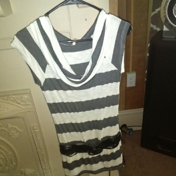 White and gray shirt with belt.