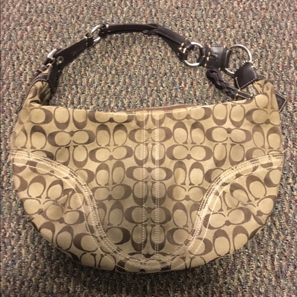 Coach purse with coach fabric cleaner included