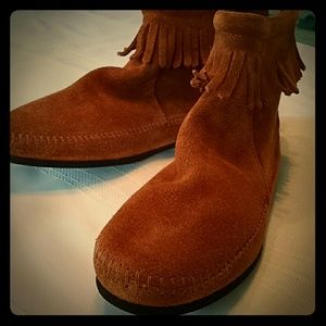 Minnetonka Moccasins. Size 7 never worn. NIB