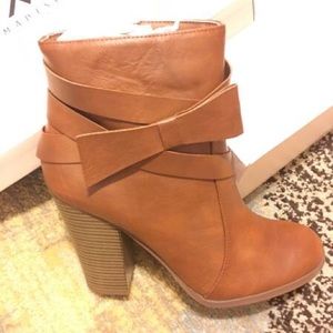 Brown leather booties.
