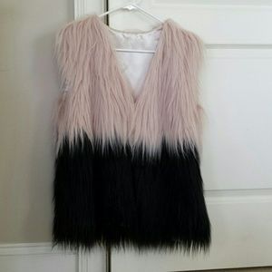 Fur vest, never worn, tags on.