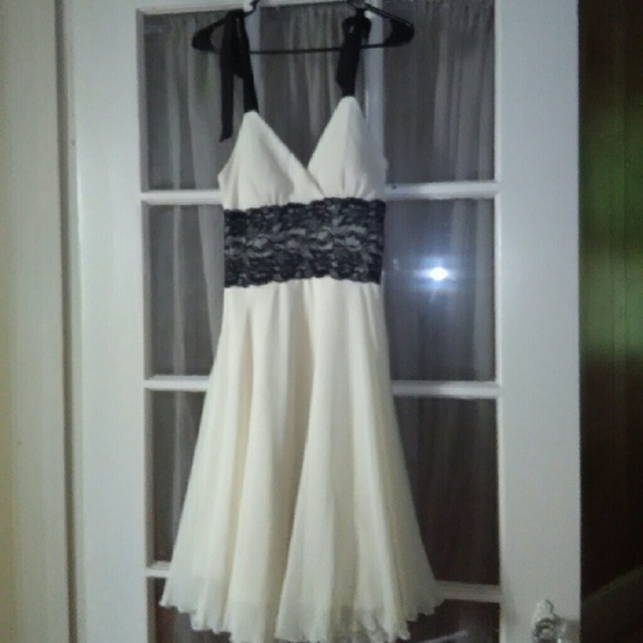 White dress with black lase.