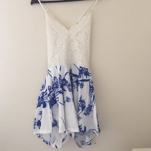 blue and white romper with lace