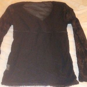 Sheer black top, with flower detail