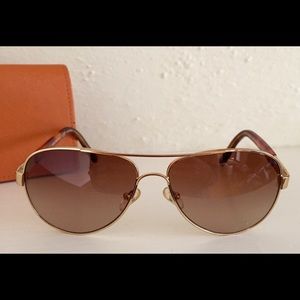 Tory Burch Aviator Sunglasses with hard case.
