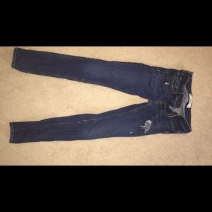Medium-dark wash ripped jeans