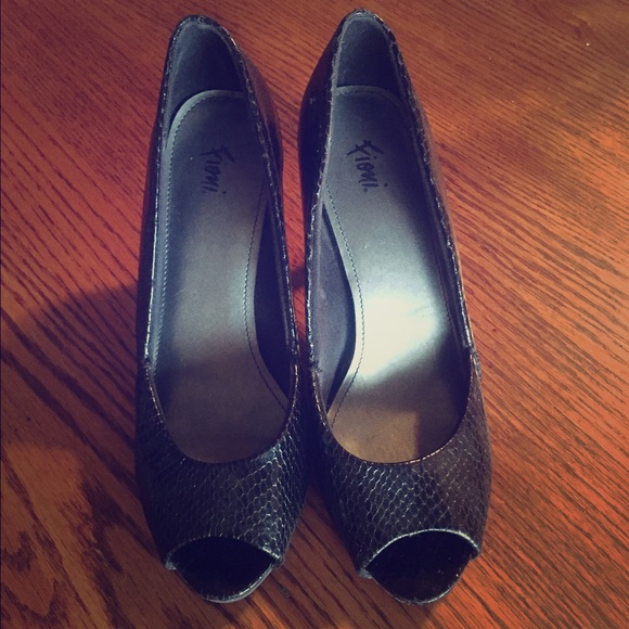 Black snakeskin peep-toe heels.