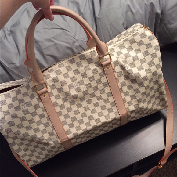 White checkered duffel bag