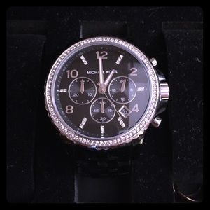 Black and silver Michael Kors authentic watch