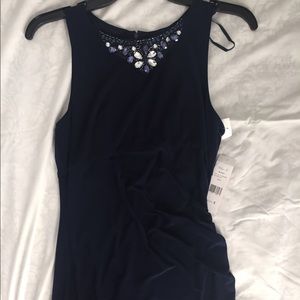 Beautiful blue and elegant form fitting dress.