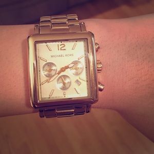 Gold square faced Michael Kors watch