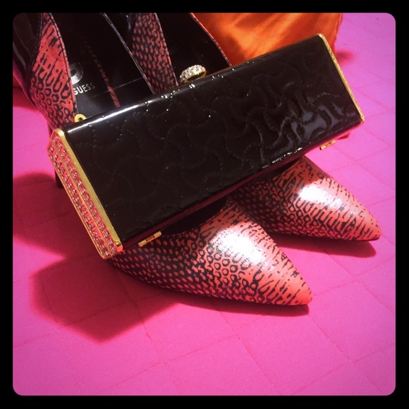 Black Patent leather clutch.
