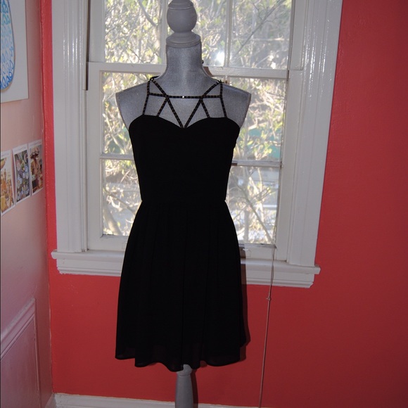 Black dress with gold jewelry-like straps