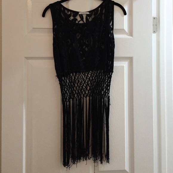Black crop top with fringe on the bottom