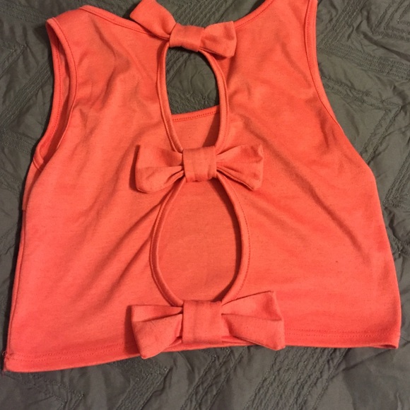 Salmon crop top with openings in back and bows