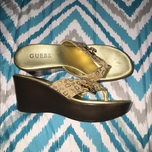 Guess: Gold Wedge Sandals