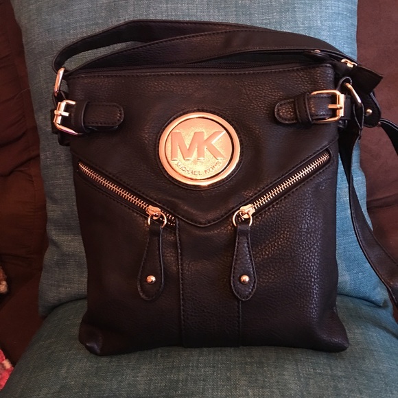 MK style cross body purse.