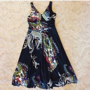 Black A-line dress with colorful paisley details