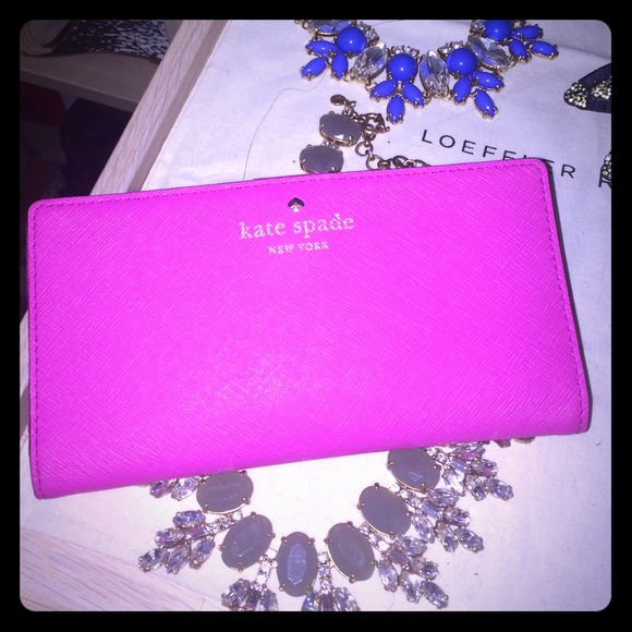 kate spade Handbags - Kate spade Stacy continental fuchsia wallet
