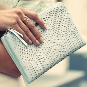 Mint green clutch.