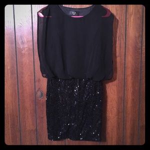 Short sequined dress.