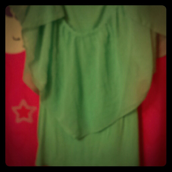 Turquoise shirt that is perfect for a nice outing