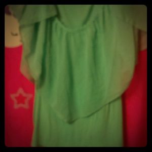 Turquoise shirt that is perfect for a nice outing
