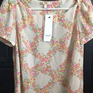 Floral top plus romper both for 10.00