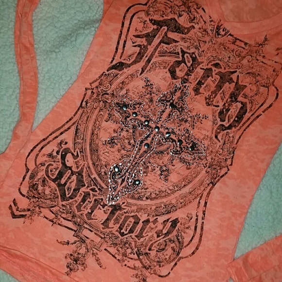 Long sleeve embellished v-neck.