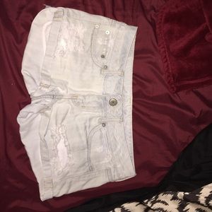 Light wash low rise ripped shorts