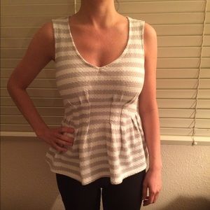 White and gray Deletta peplum tank.