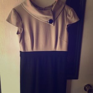 Knee length nude and black tight fit dress