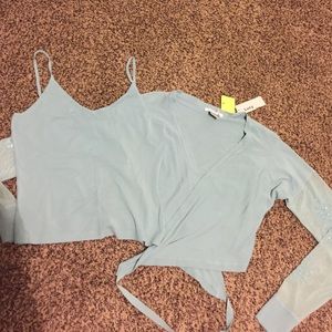 Beautiful wrap sweater and camisole .