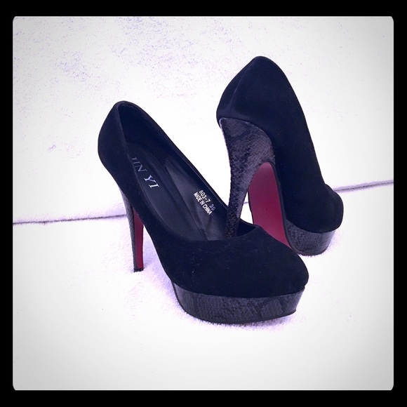 Black Saude red bottomed shoes