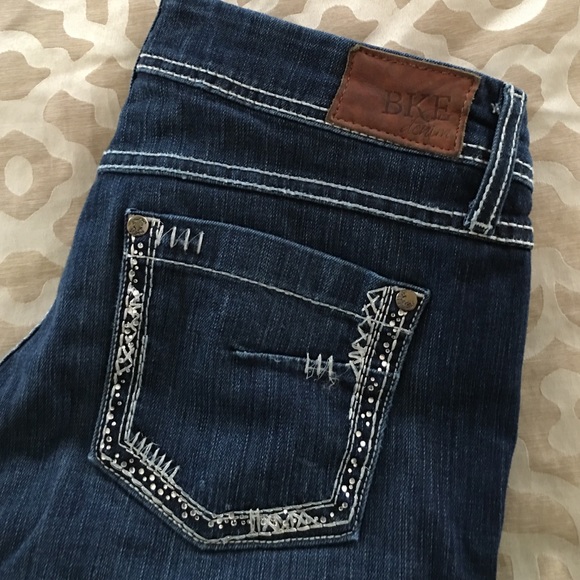 Buckle Skinny Jeans
