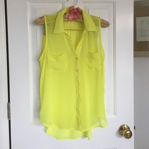 Sheer bright yellow sleeveless blouse