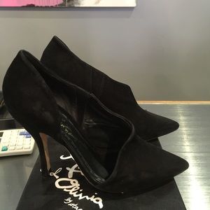 Black suede pumps