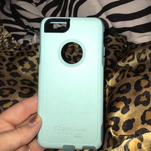 Mint blue IPhone 6|6s otter box.