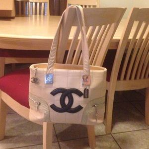 Beige handbag with silver accents