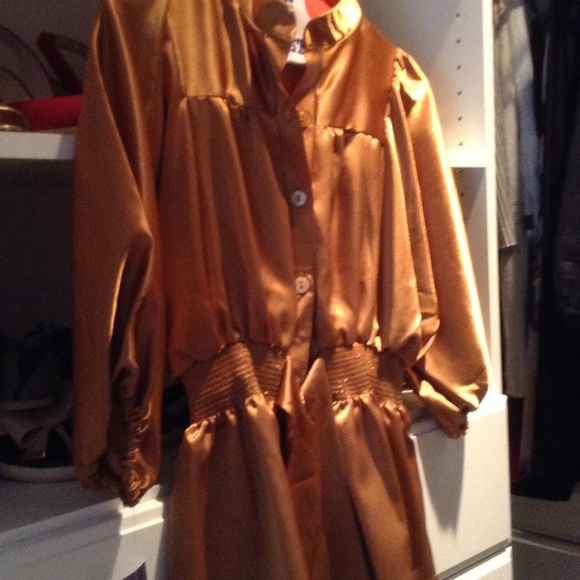 Gold blouse with and elastic waist and tie for bow