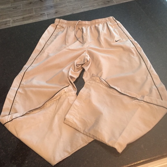 Men's Nike track pants.
