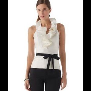 Silk White ruffled blouse.