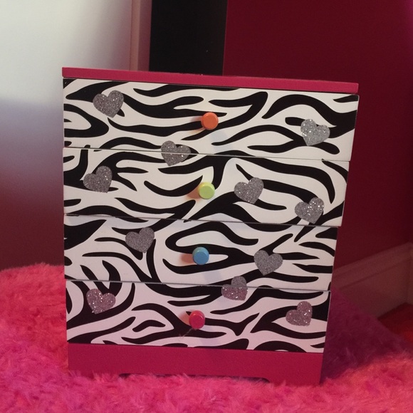 This is a wooden,  dark pink , jewelry box!