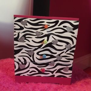 This is a wooden,  dark pink , jewelry box!