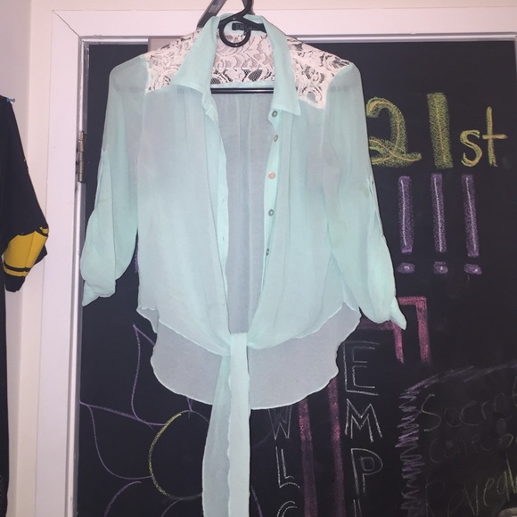 Mint colored Love Culture top. Small.