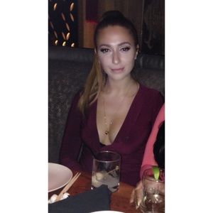 Long sleeve Maroon dress.