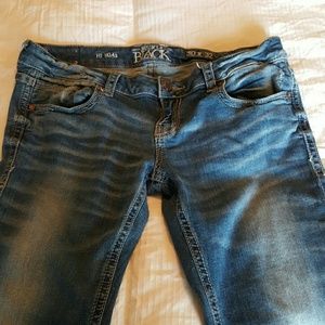 Buckle black skinny jeans